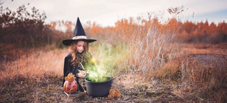 girl dressed as a witch