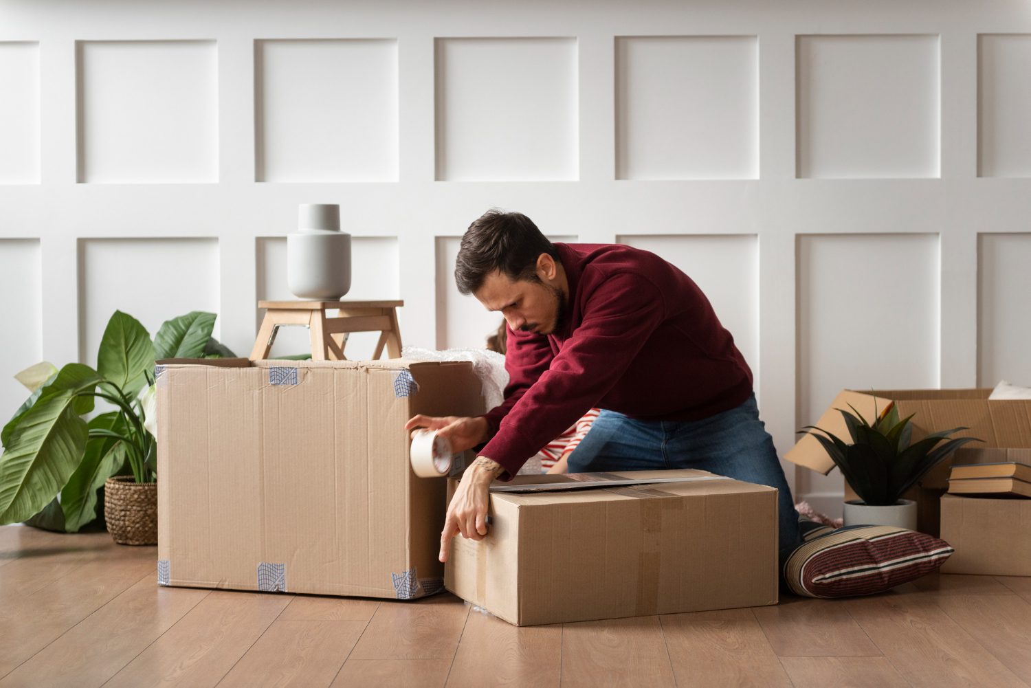 person packing to move